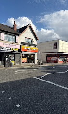 Phone Store seen from across Walton Vale, next to Ranchers Chicken